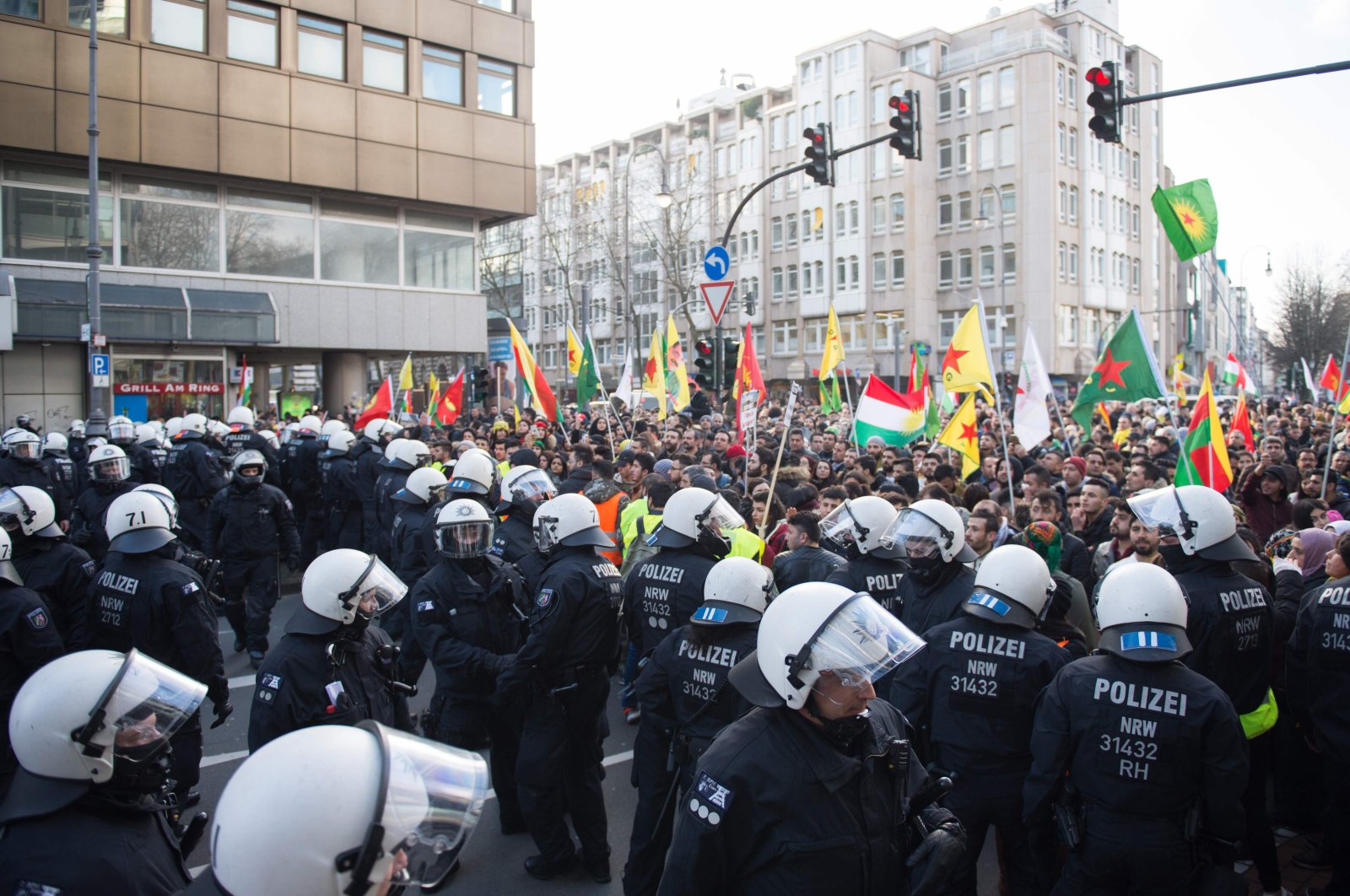 Police officers stop a pro-PKK mass demonstration in Cologne, western Germany, Jan. 27, 2018. (AFP)