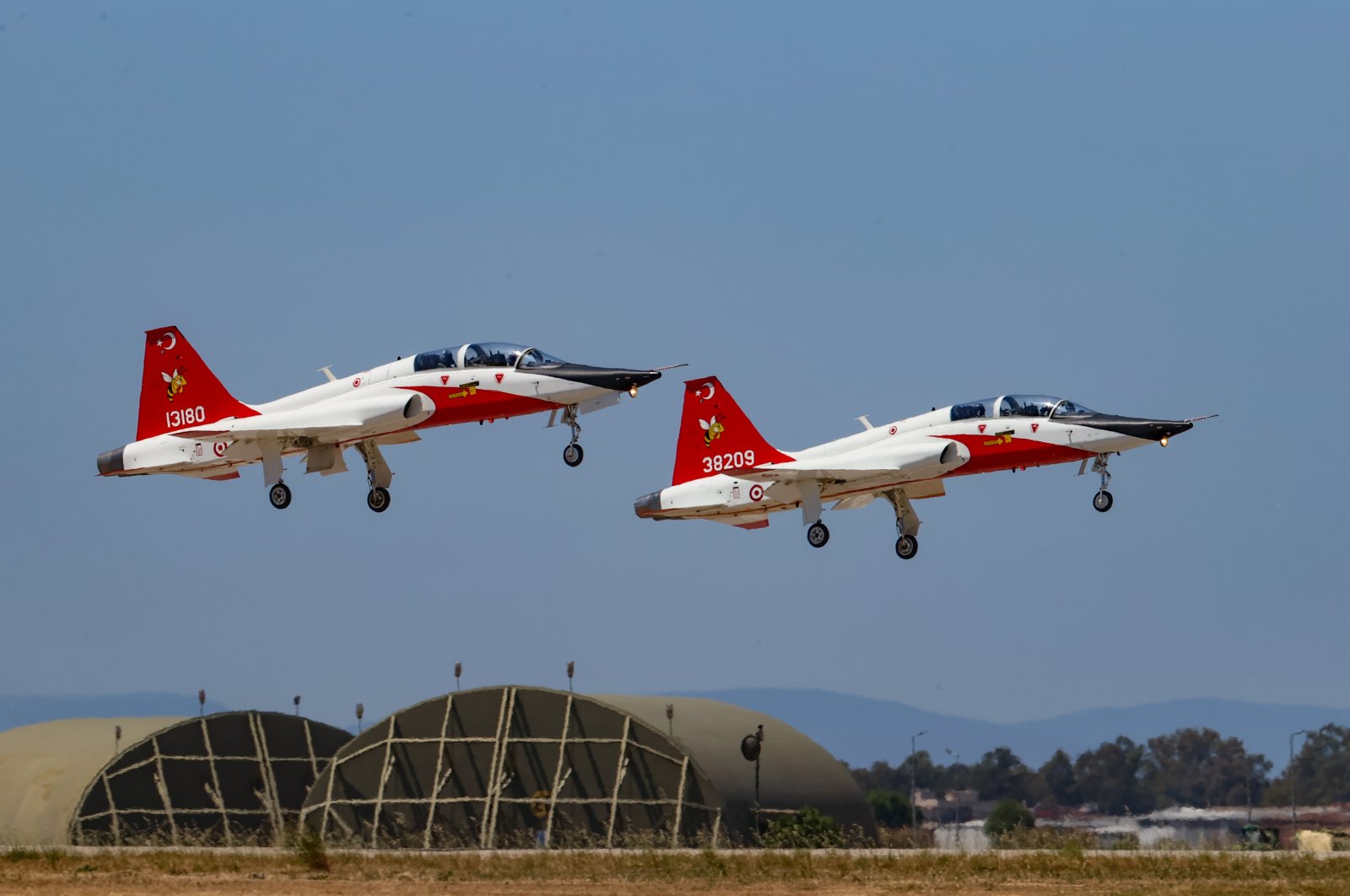 Two aircraft fly during a training session in Izmir, western Turkey, July 29, 2022. (AA PHOTO)