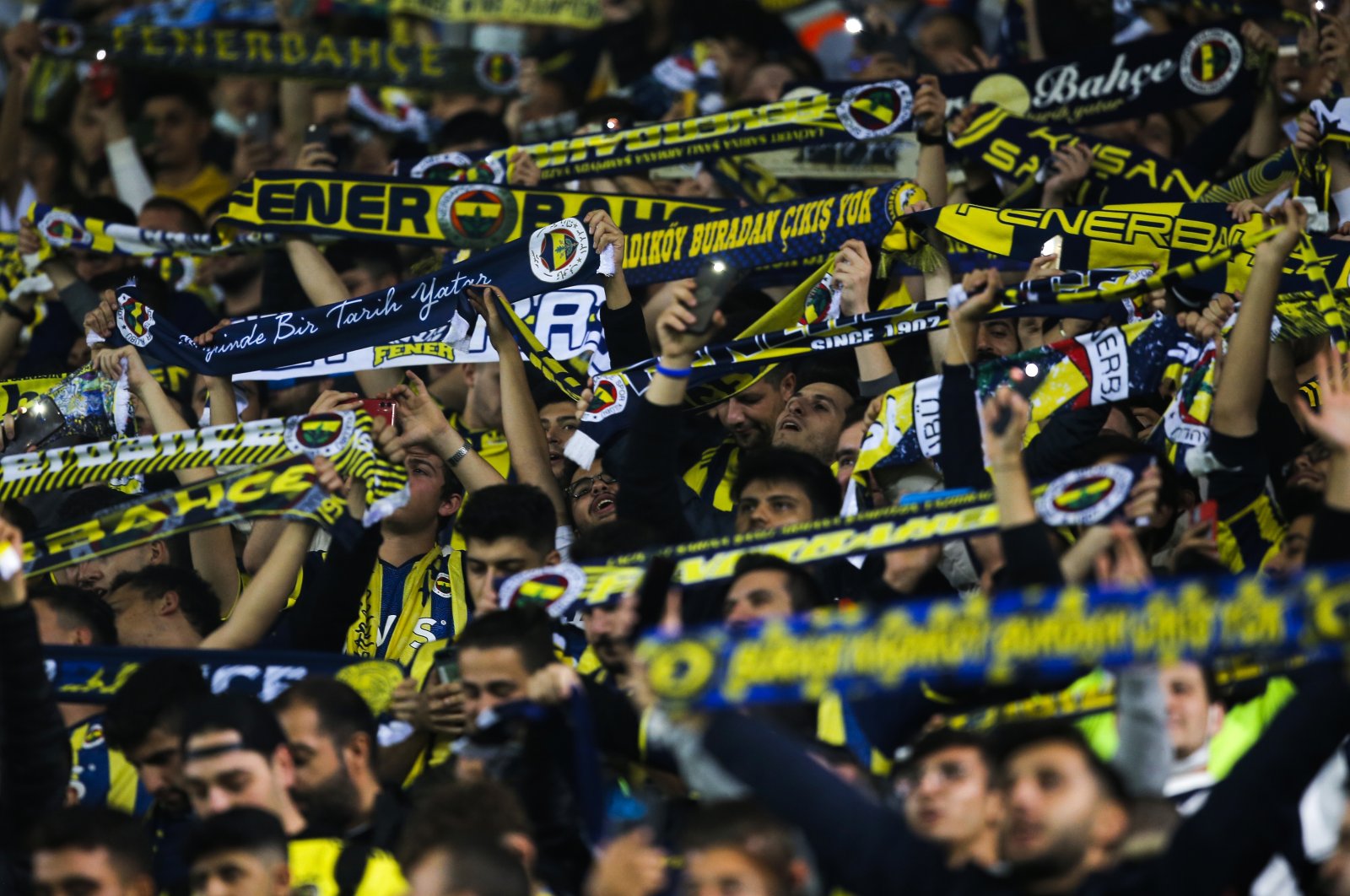 Fenerbahçe fans cheer prior to the Europa League group D soccer match between Fenerbahçe and Antwerp at the Sukru Saracoglu stadium in Istanbul, Turkey, Oct. 21, 2021. (AP File Photo)