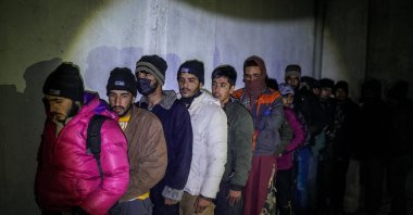 Security forces raid a house used by human traffickers in Van, eastern Turkey, Dec. 7, 2021. (Photo by Uğur Yıldırım)