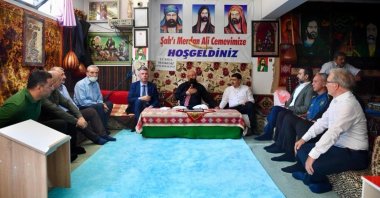 Ankara Governor Vasip Şahin(Center R) visits the Şah-ı Merdan Cemevi in Ankara, July 31, 2022. (AA Photo)