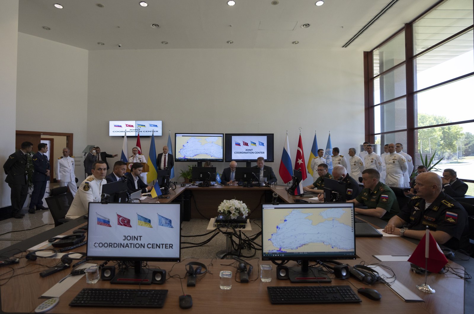 Representatives from the Russian and Ukrainian defense ministries attend the launch of the joint coordination center in Istanbul, Turkey, July 27, 2022. (AP Photo)
