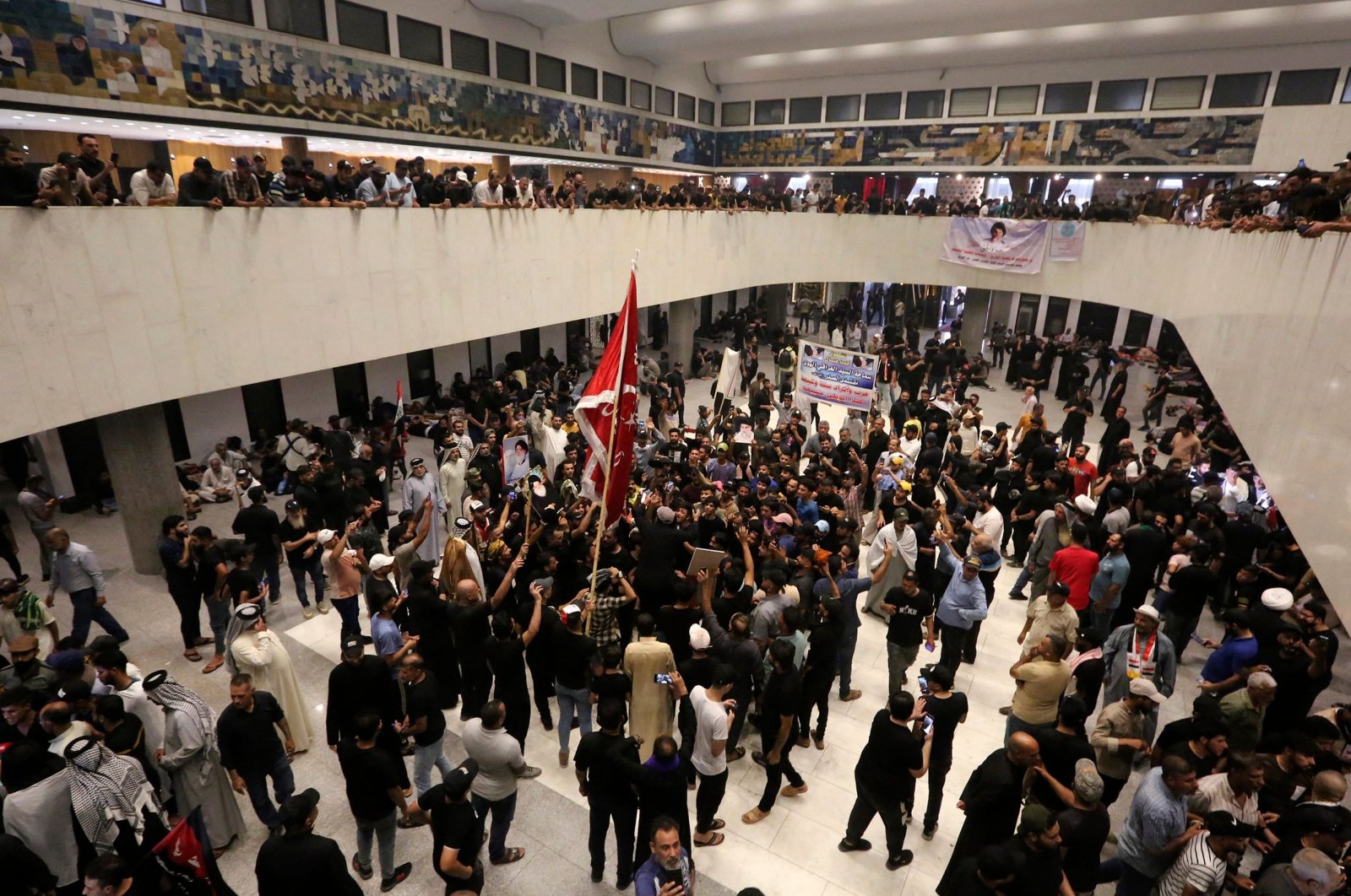 Supporters of Iraqi cleric Muqtada al-Sadr, protesting against a rival bloc&#039;s nomination for prime minister, gather inside the parliament in the high-security Green Zone in the capital Baghdad, Iraq, July 31, 2022. (AFP Photo)