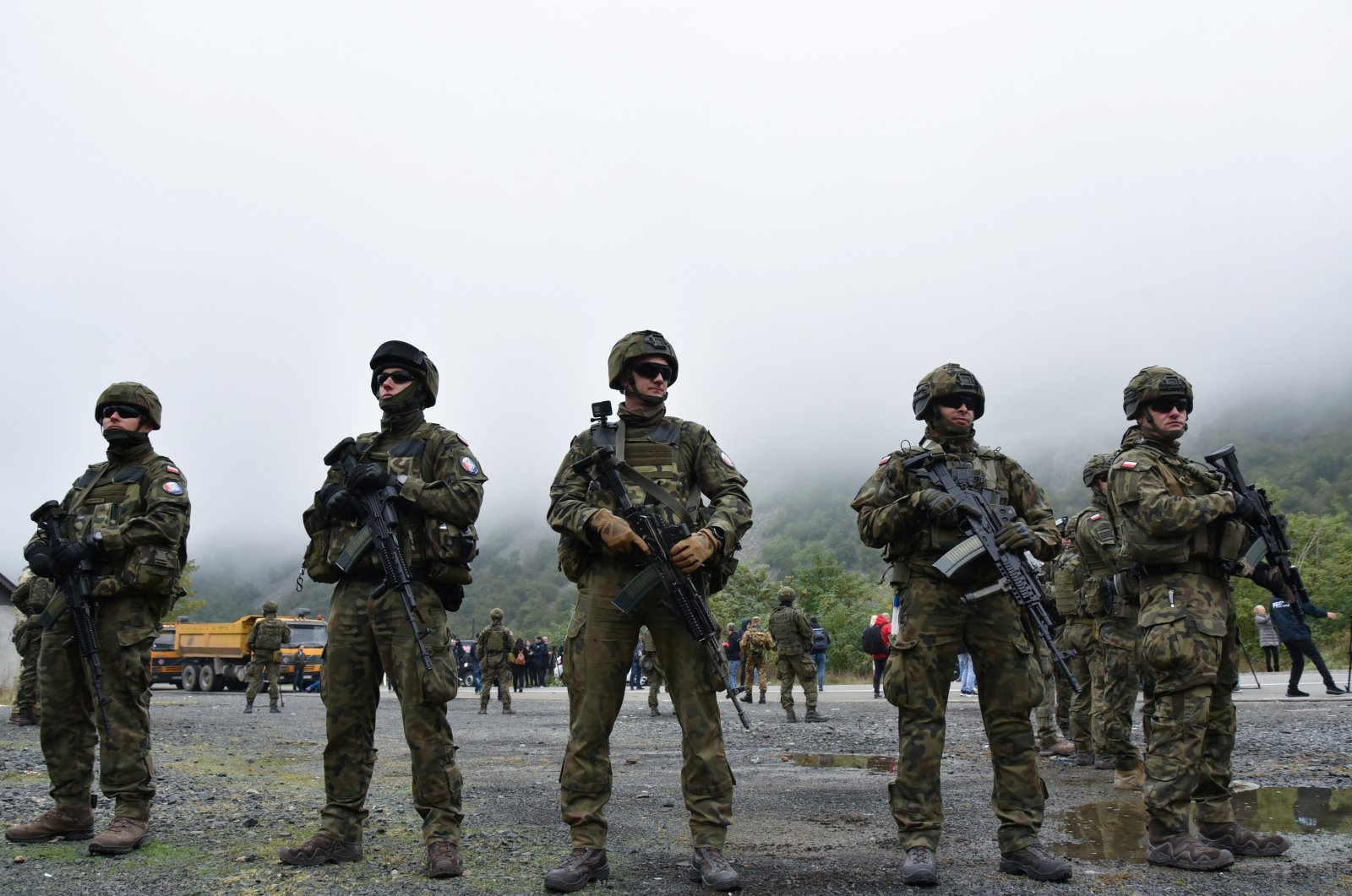 Members of the KFOR peacekeeping force patrol the area near the border crossing between Kosovo and Serbia in Jarinje, Kosovo, Oct. 2, 2021. (Reuters File Photo)