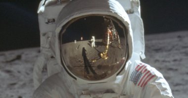 Astronaut Neil Armstrong reflected in the helmet visor of Buzz Aldrin on the surface of the moon, July 20, 1969. (AP Photo)