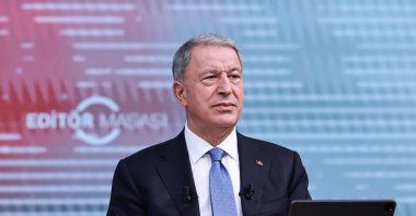 Defense Minister Hulusi Akar speaks to Anadolu Agency's (AA) editorial desk, in the capital Ankara, Turkey, Aug. 1, 2022. (AA Photo)