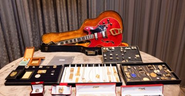 A view of a guitar and a collection of personal jewelry of Elvis Presley and Colonel Tom Parker that was lost for decades and will be sold at auction in August, at the Sunset Marquis Hotel, in Hollywood, California, U.S., July 28, 2022. (Reuters Photo)