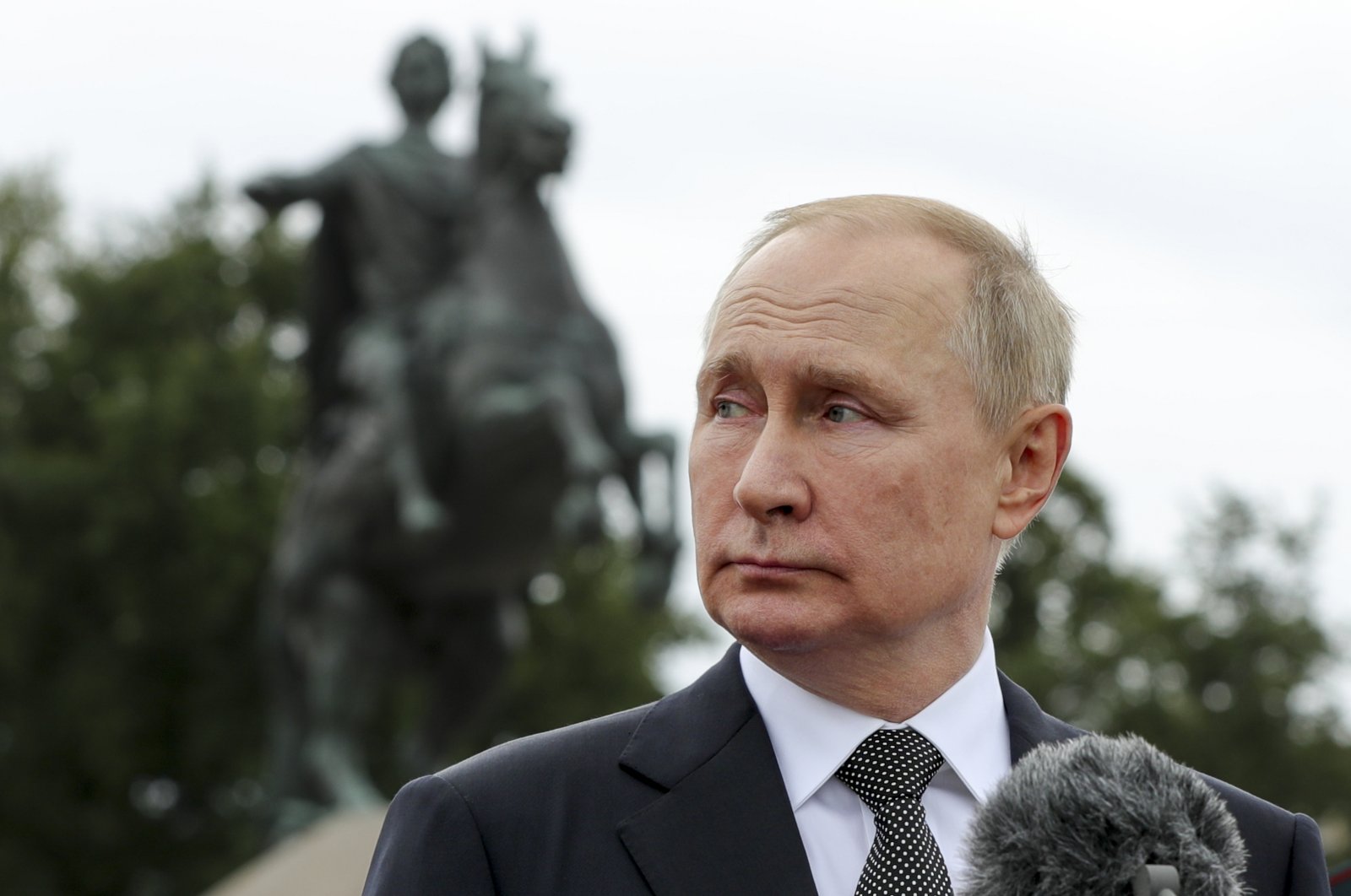 Russian President Vladimir Putin delivers a speech in front of the equestrian statue of Peter the Great, on the Neva River, in St. Petersburg, Russia, July 31, 2022. (AP Photo)