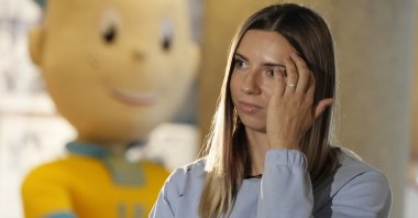 Belarusian Olympic sprinter Krystsina Tsimanouskaya speaks to the media, Warsaw, Poland, Aug. 11, 2021. (AP Photo)