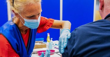 A person receives a dose of the Monkeypox vaccine, in Hague, the Netherlands, Aug. 1, 2022. (AFP PHOTO)