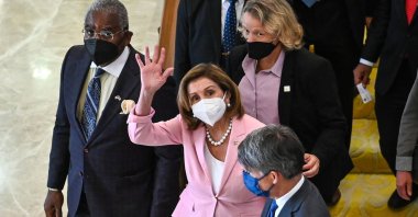 U.S. House of Representatives Speaker Nancy Pelosi waves as she leaves Malaysia&#039;s Parliament after a meeting with Malaysian officials in Kuala Lumpur, Malaysia, Aug. 2, 2022. (Malaysia Department of Information via AFP)
