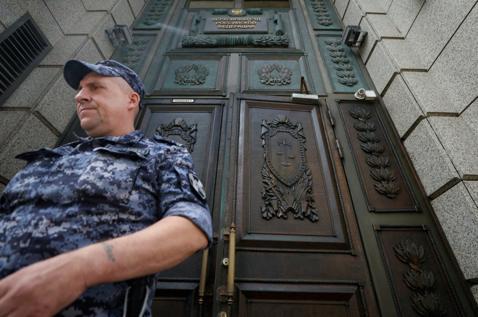 A member of the Russian National Guard leaves the building of Russia&#039;s Supreme Court before a hearing on whether to designate Ukraine&#039;s Azov Regiment as a terrorist entity in Moscow, Russia, Aug. 2, 2022. (Reuters Photo)