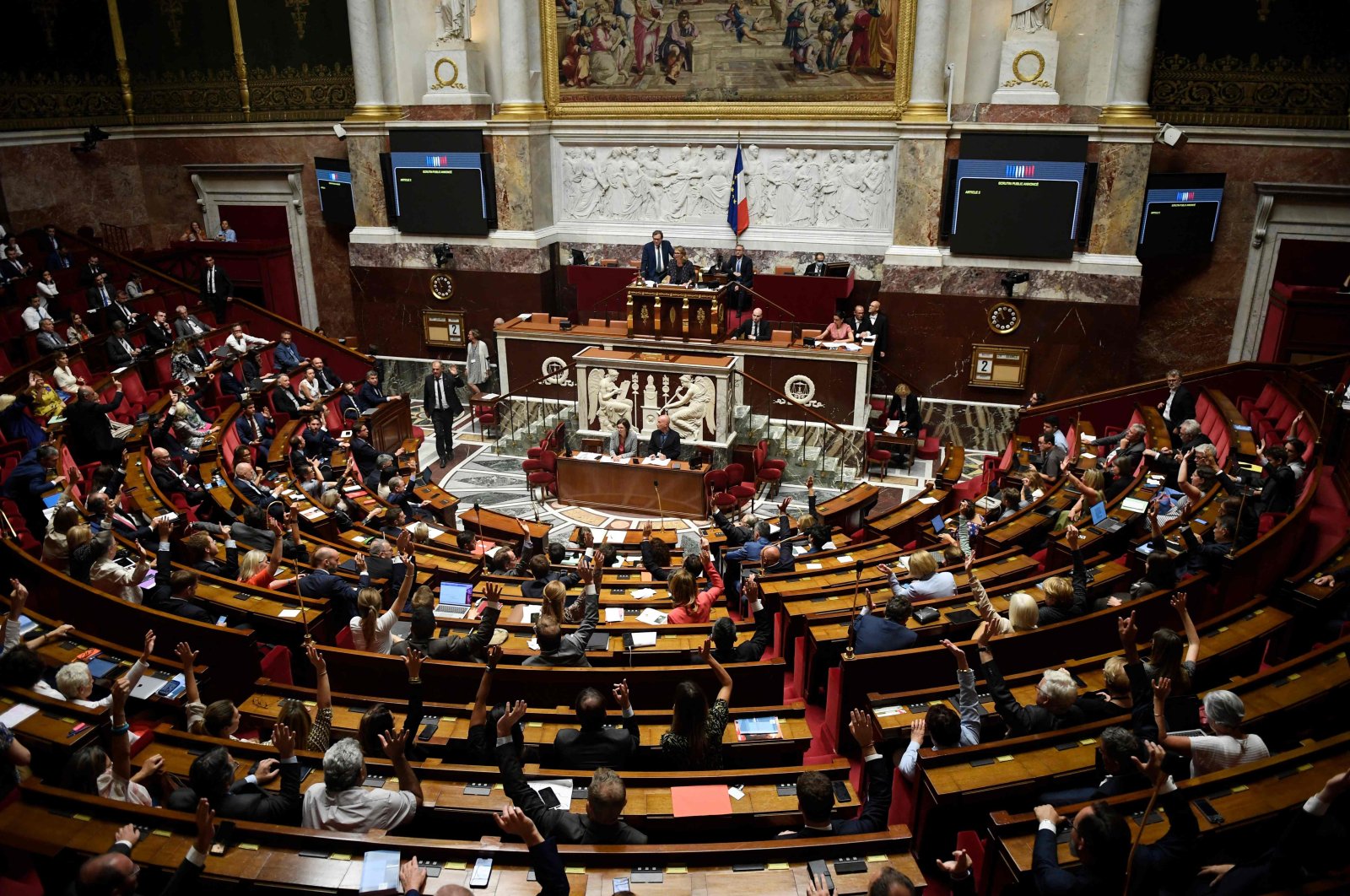 French lawmakers take part in a session at the National Assembly, Paris, France, Aug. 2, 2022.(AFP Photo)