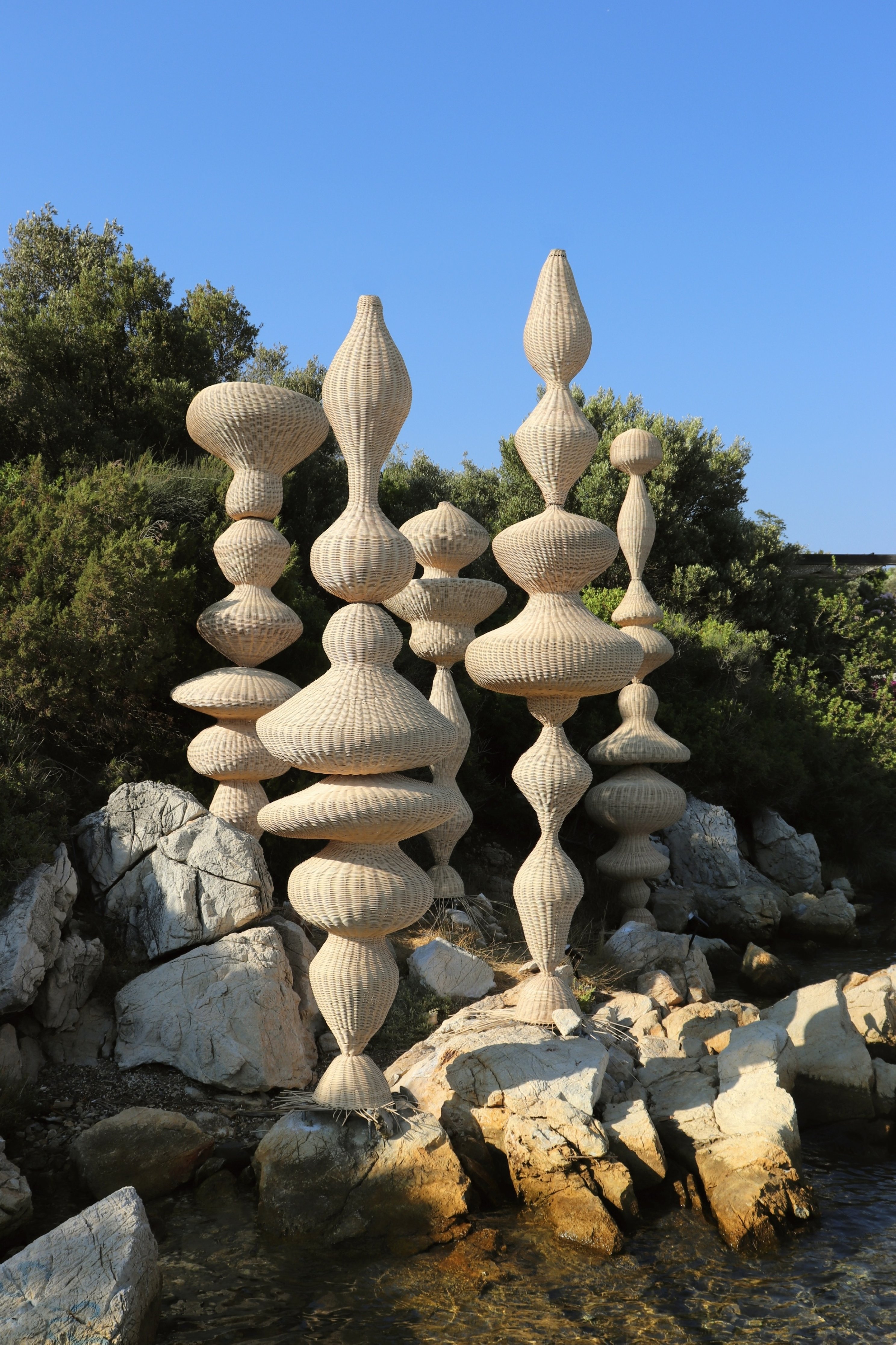 Christian Mohaded, 'Waving Towers,' 2022, handwoven rattan on steel pole with concrete base. (Courtesy of ISTANBUL’74)