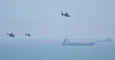 Chinese military helicopters fly past Pingtan island, one of mainland China's closest point from Taiwan, ahead of massive military drills off Taiwan after U.S. House Speaker Nancy Pelosi's visit, Fujian province, China, Aug. 4, 2022. (AFP Photo)