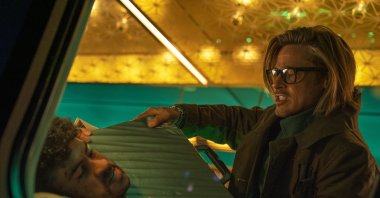 This image released by Sony Pictures shows Bad Bunny (L) and Brad Pitt in a scene from "Bullet Train." (AP Photo)