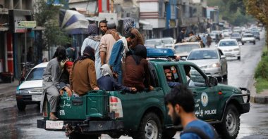 Taliban fighters drive a car on a street following the killing of Al Qaeda leader Ayman al-Zawahiri in a U.S. strike over the weekend, in Kabul, Afghanistan, Aug. 2, 2022. (Reuters Photo)