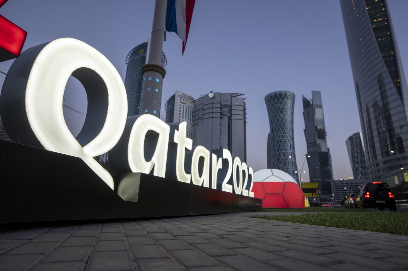World Cup Branding is displayed near the Doha Exhibition and Convention Center, in Doha, Qatar, March 31, 2022. (AP PHOTO)