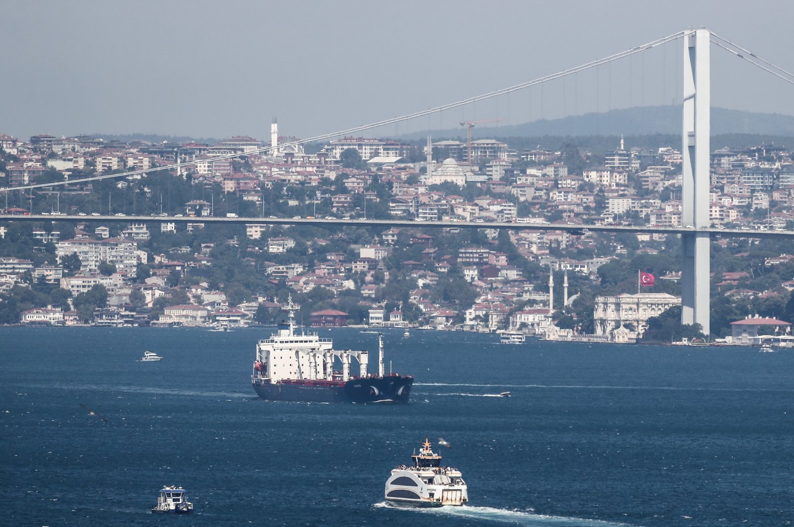 The Sierra Leone-flagged cargo ship Razoni, which left the port of Odessa with the first grain shipment for export, sails through the Bosporus after an inspection in Istanbul, Turkey, Aug. 3, 2022. (EPA Photo)