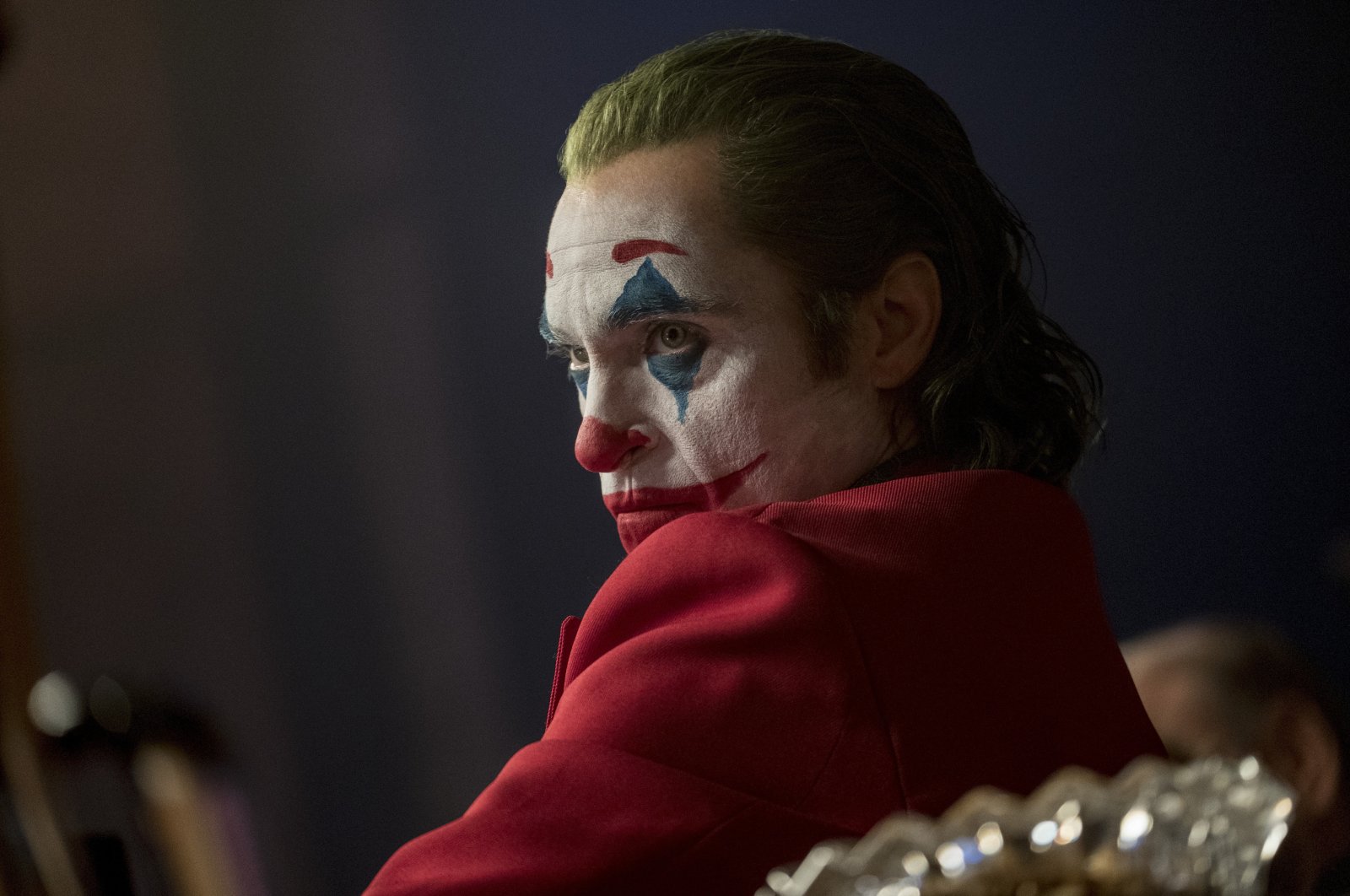 This image released by Warner Bros. Pictures shows Joaquin Phoenix in a scene from &quot;Joker.&quot;  (AP Photo)