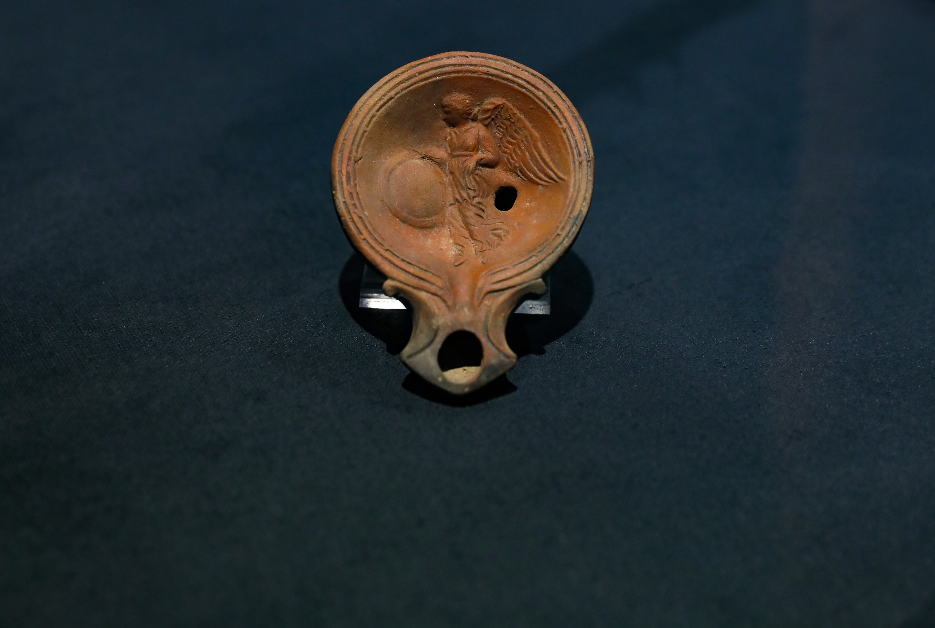 An artifact depicting the ancient Greek goddess Nike at Izmir Archaeology Museum, Izmir, Turkey, Aug. 4, 2022. (AA Photo)