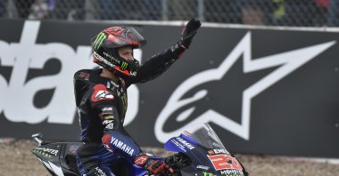 Fabio Quartararo waves to fans after the MotoGP race, in Silverstone, England, Aug. 29, 2021. (AP PHOTO) 