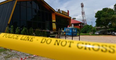 Police tape is pictured around the Mountain B nightclub after a deadly fire in Sattahip district in Chonburi province, Thailand, Aug. 5, 2022. (AFP Photo)