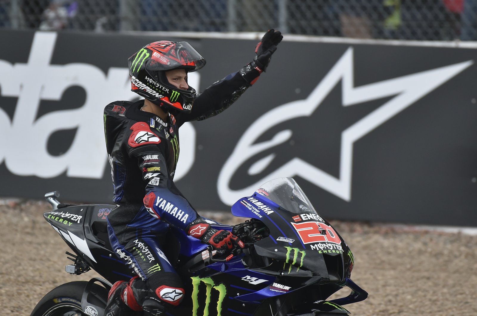 Fabio Quartararo waves to fans after the MotoGP race, in Silverstone, England, Aug. 29, 2021. (AP PHOTO) 
