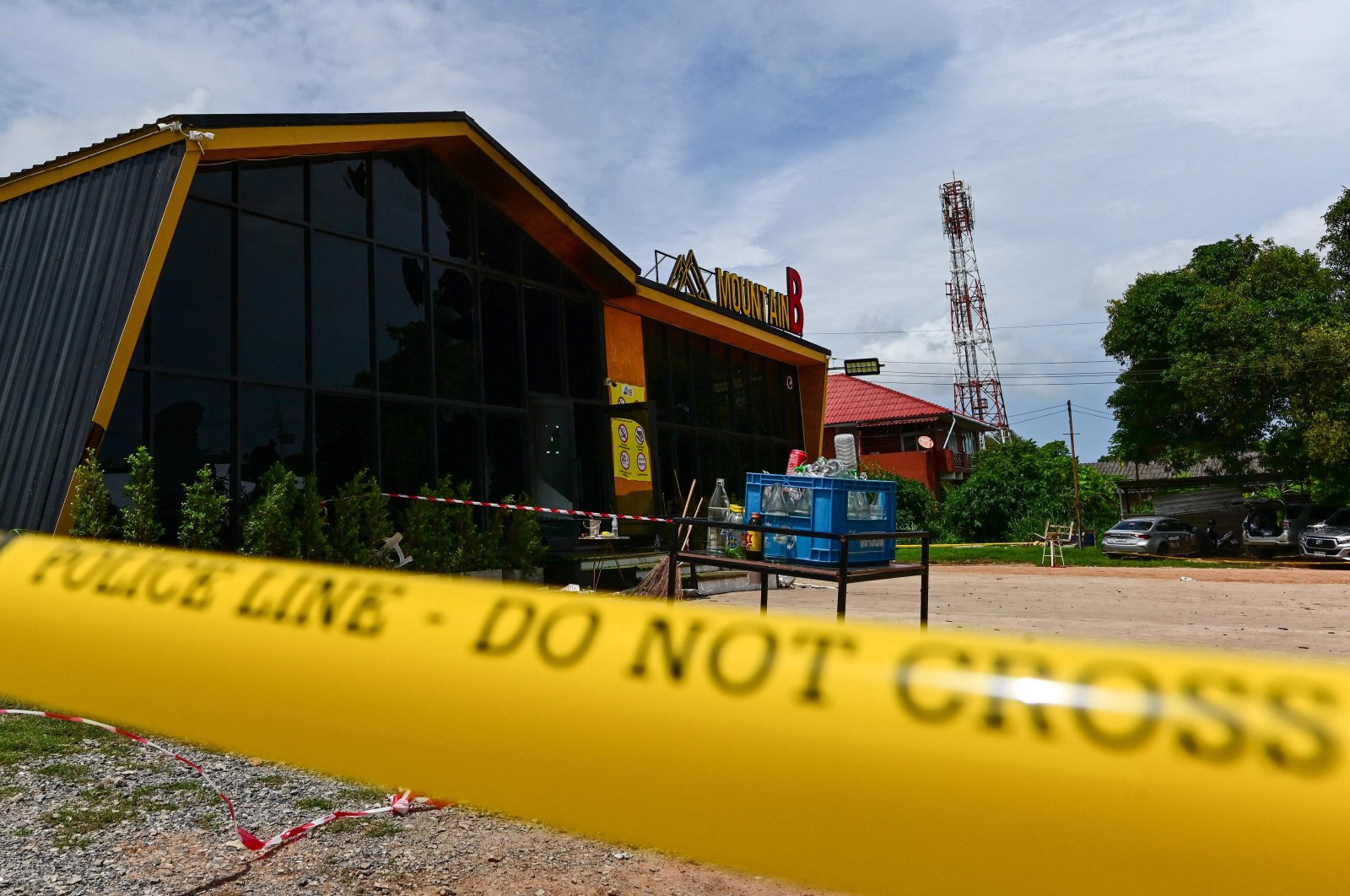 Police tape is pictured around the Mountain B nightclub after a deadly fire in Sattahip district in Chonburi province, Thailand, Aug. 5, 2022. (AFP Photo)