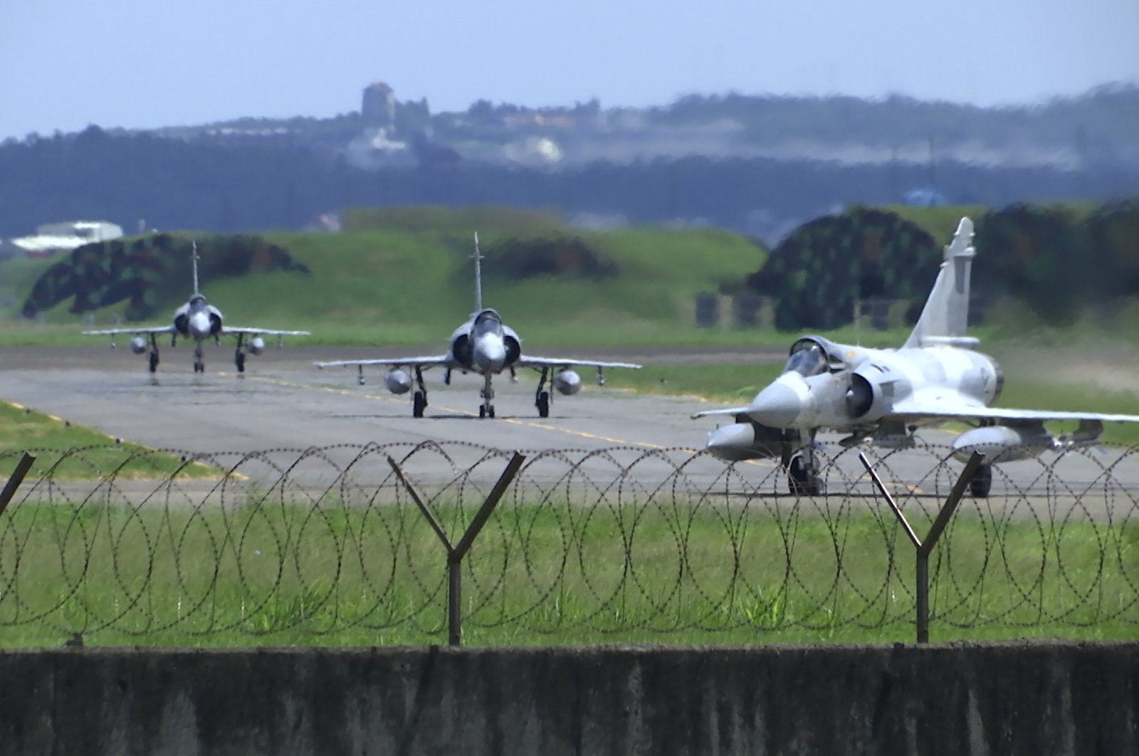 Taiwan Air Force Mirage fighter jets taxi on a runway at an airbase in Hsinchu, Taiwan, Aug. 5, 2022. (AP Photo)