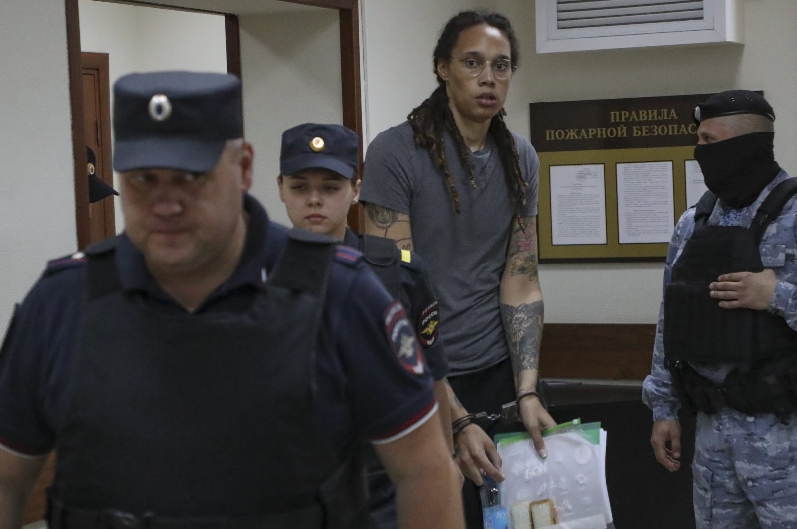 Brittney Griner (C) is escorted to a courtroom for a hearing in Khimki, Russia, Aug. 4, 2022. (EPA PHOTO) 