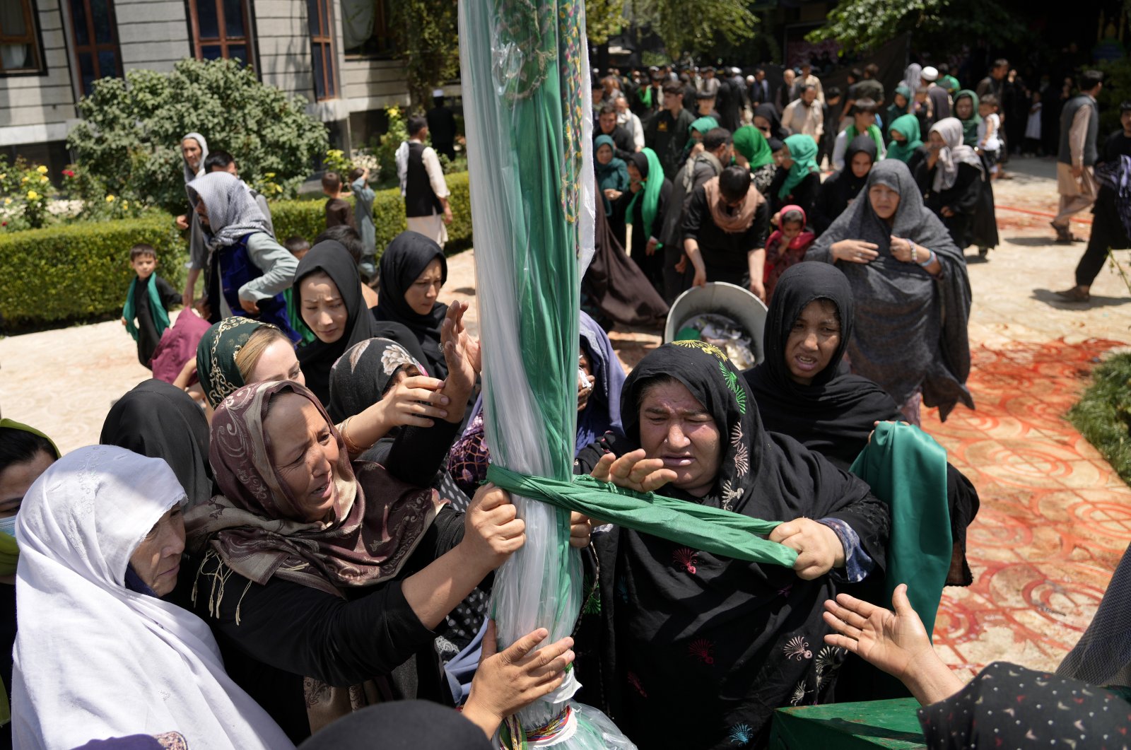 Afghan Shiite Muslim women attend a mourning ceremony three days ahead of Ashura at a mosque in Kabul, Afghanistan, Aug. 5, 2022. (AP Photo)