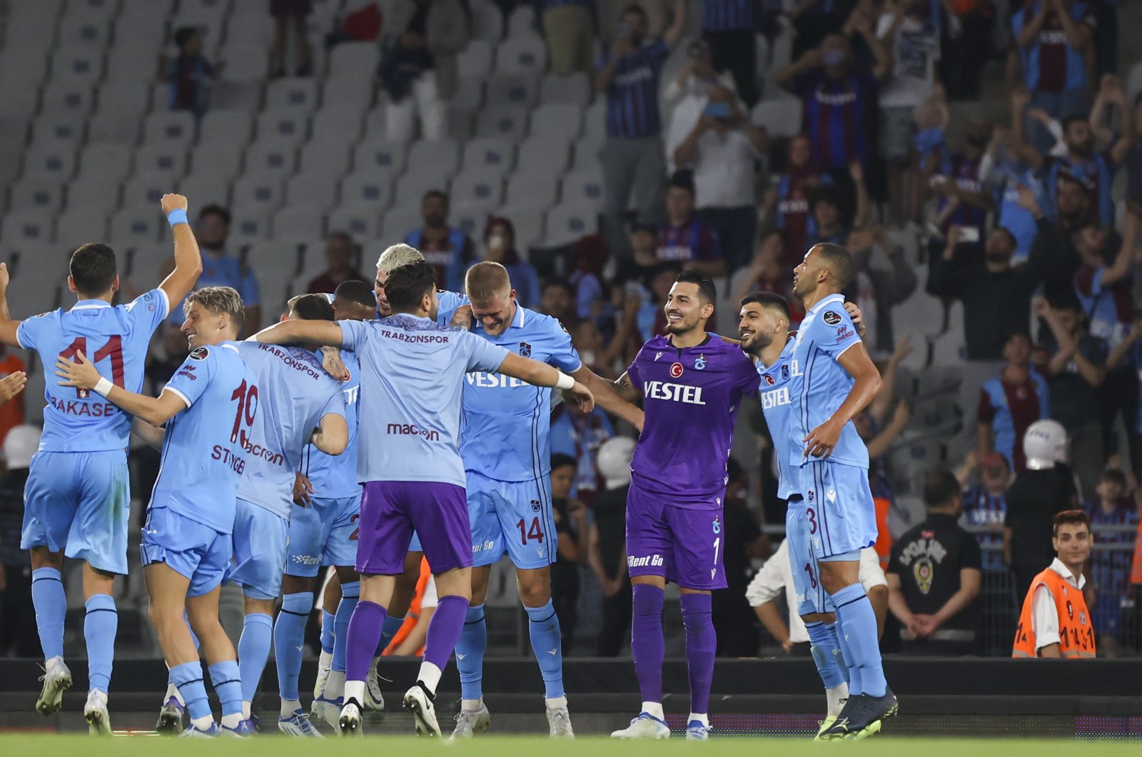 Trabzonspor players celebrate after winning the opening match in the Spor Toto Süper Lig 2022-2023 season, Atatürk Olympic Stadium, Istanbul, Turkey, Aug. 5, 2022. (AA Photo)