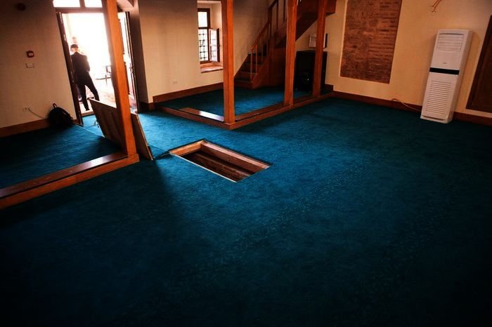 The interior of the restored Lala Hayrettin Mosque showing the trapdoor leading to the tomb of a priest, Istanbul, Turkey, Aug. 5, 2022. (Sabah Photo)