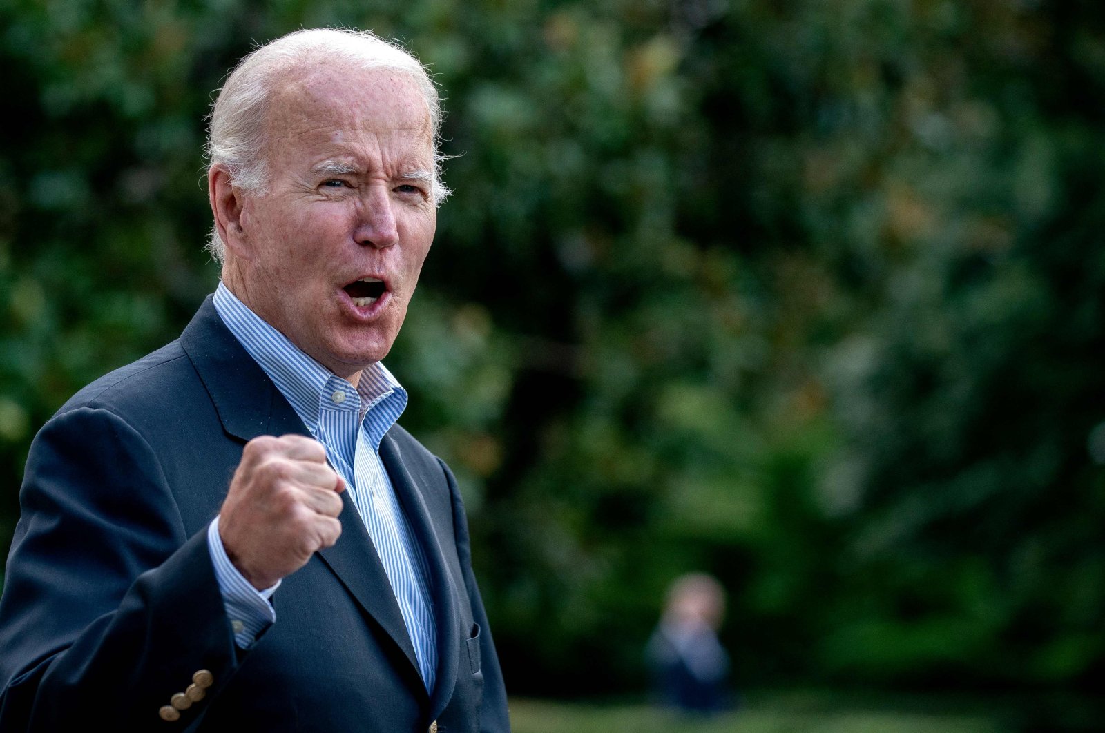 U.S. President Joe Biden answers a shouted question from a reporter while walking to Marine One on the South Lawn of the White House in Washington, DC, U.S., on Aug. 7, 2022. (AFP Photo)