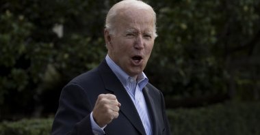 U.S. President Joe Biden gestures as he walks on the South Lawn to depart by Marine One, at the White House in Washington, D.C., U.S., Aug. 7, 2022. (EPA Photo)