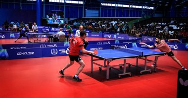Players compete at table tennis qualification event, in Konya, central Turkey, Aug. 7, 2022. (AA PHOTO) 