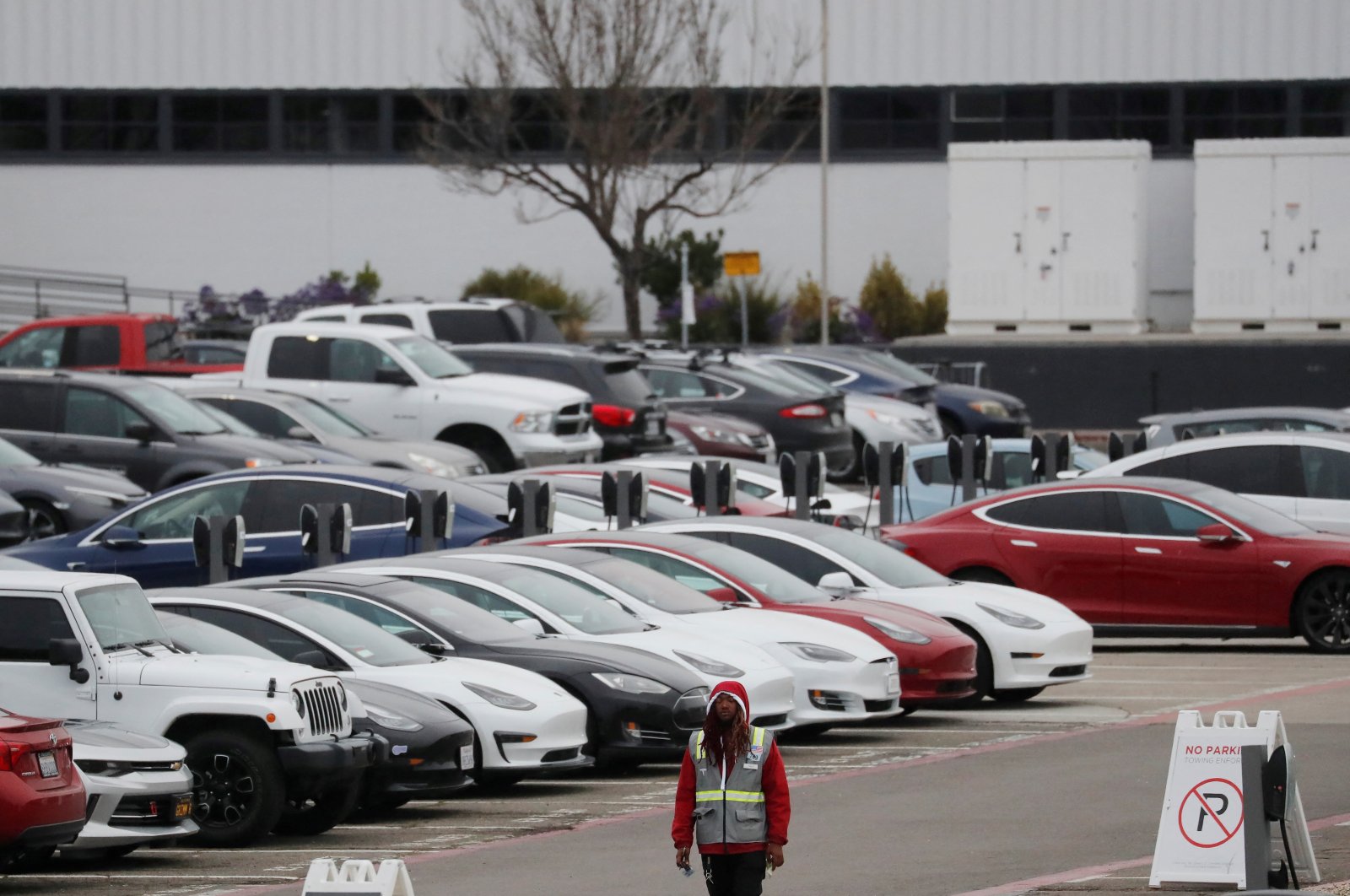 Cars are parked in the employee parking lot at Tesla Inc.&#039;s U.S. vehicle factory in Fremont, California, U.S., March 18, 2020. (Reuters Photo)