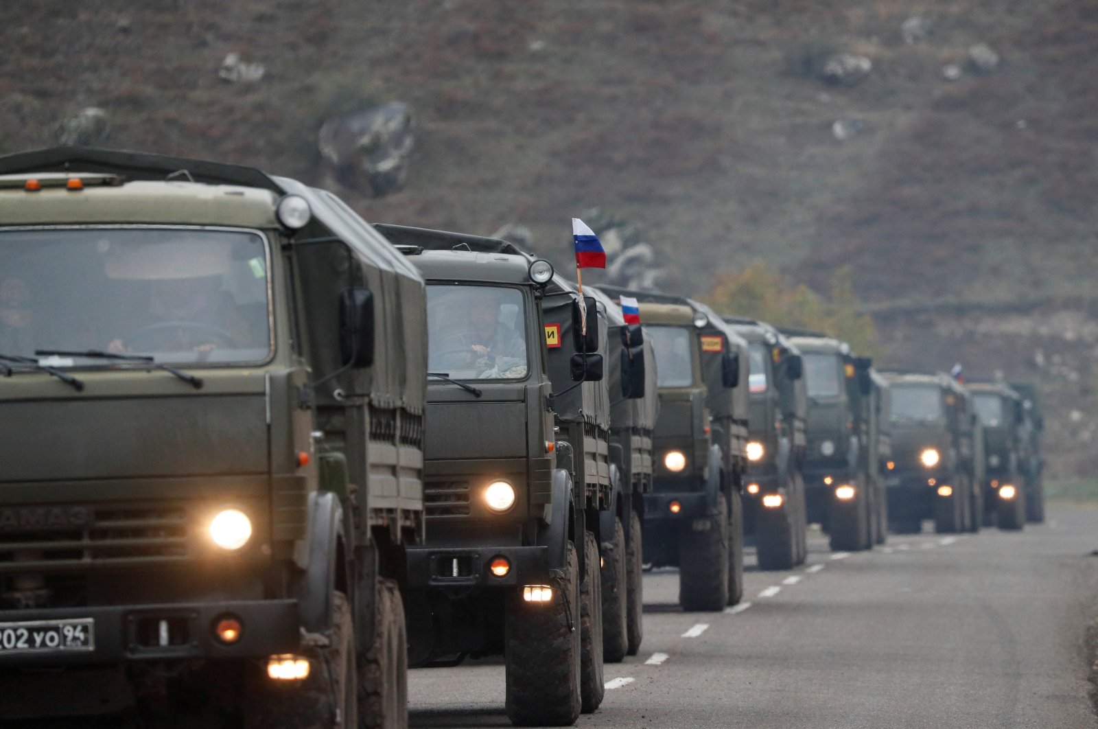 Trucks of the Russian peacekeeping forces drive along a road near Lachin in the region of Nagorno-Karabakh, Nov. 13, 2020. (Reuters File Photo)