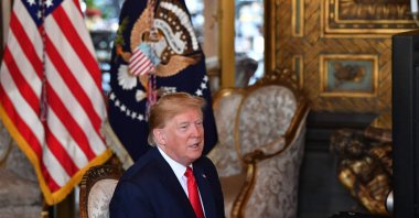 Former U.S. President Donald Trump makes a video call to troops stationed worldwide at the Mar-a-Lago estate in Palm Beach Florida, U.S., Dec. 24, 2019. (AFP Photo)