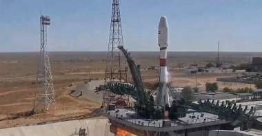 This handout video grab taken and released on Aug. 9, 2022, by the Russian Space Agency Roscosmos shows the Soyuz-2.1b rocket carrying the Khayyam satellite blasting off from a launchpad at the Baikonur Cosmodrome. An Iranian satellite launched by Russia blasted off from Kazakhstan early on Aug. 9, 2022,  and went into orbit amid controversy that Moscow might use it to improve its surveillance of military targets in Ukraine. (AFP Photo)