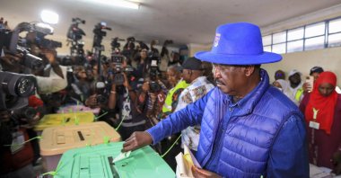 Kenya’s Azimio la Umoja (Declaration of Unity) political coalition presidential candidate and Kenya’s opposition leader Raila Odinga (R), casts his ballot during the general elections at a polling station in Kibera, Nairobi, Kenya, Aug. 9, 2022 (EPA Photo)