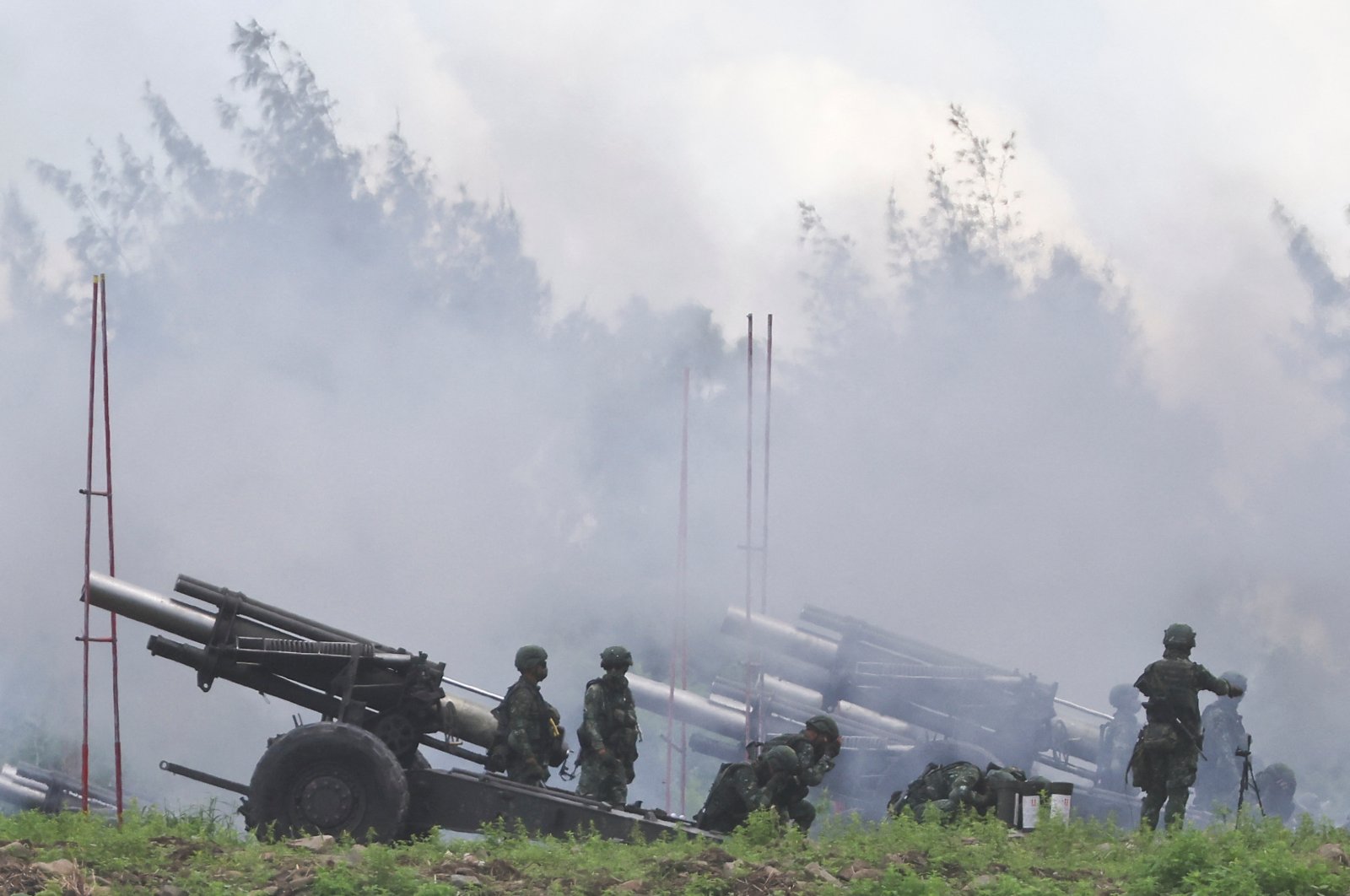 Soldiers fire 155mm howitzers during an annual live fire military exercise in Pingtung county, southern Taiwan, Aug. 9, 2022. (Reuters Photo)
