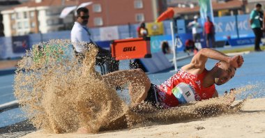 Turkish athlete Necati Er during his gold-winning jump at the 5th Islamic Solidarity Games, Konya, Türkiye, Aug. 10, 2022. (DHA Photo)