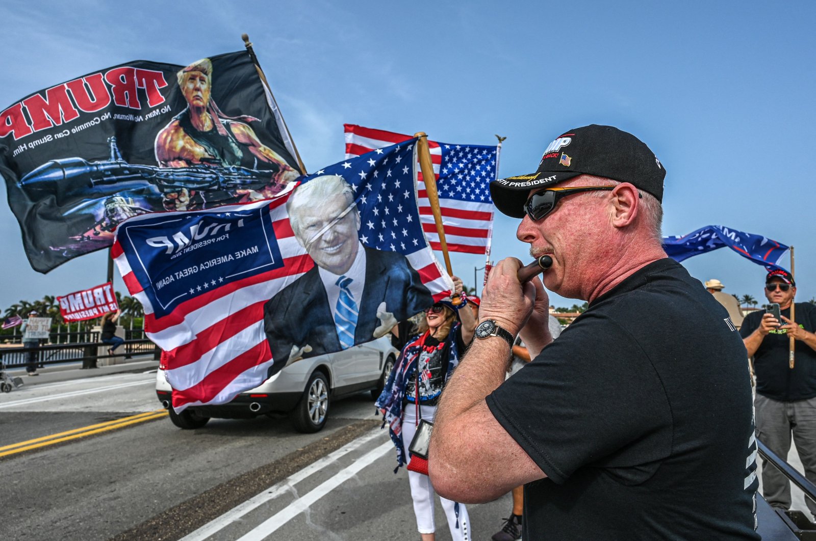 Supporters of former U.S. President Donald Trump gather near his residence at Mar-A-Lago in Palm Beach, Florida, U.S., Aug. 9, 2022. (AFP Photo)
