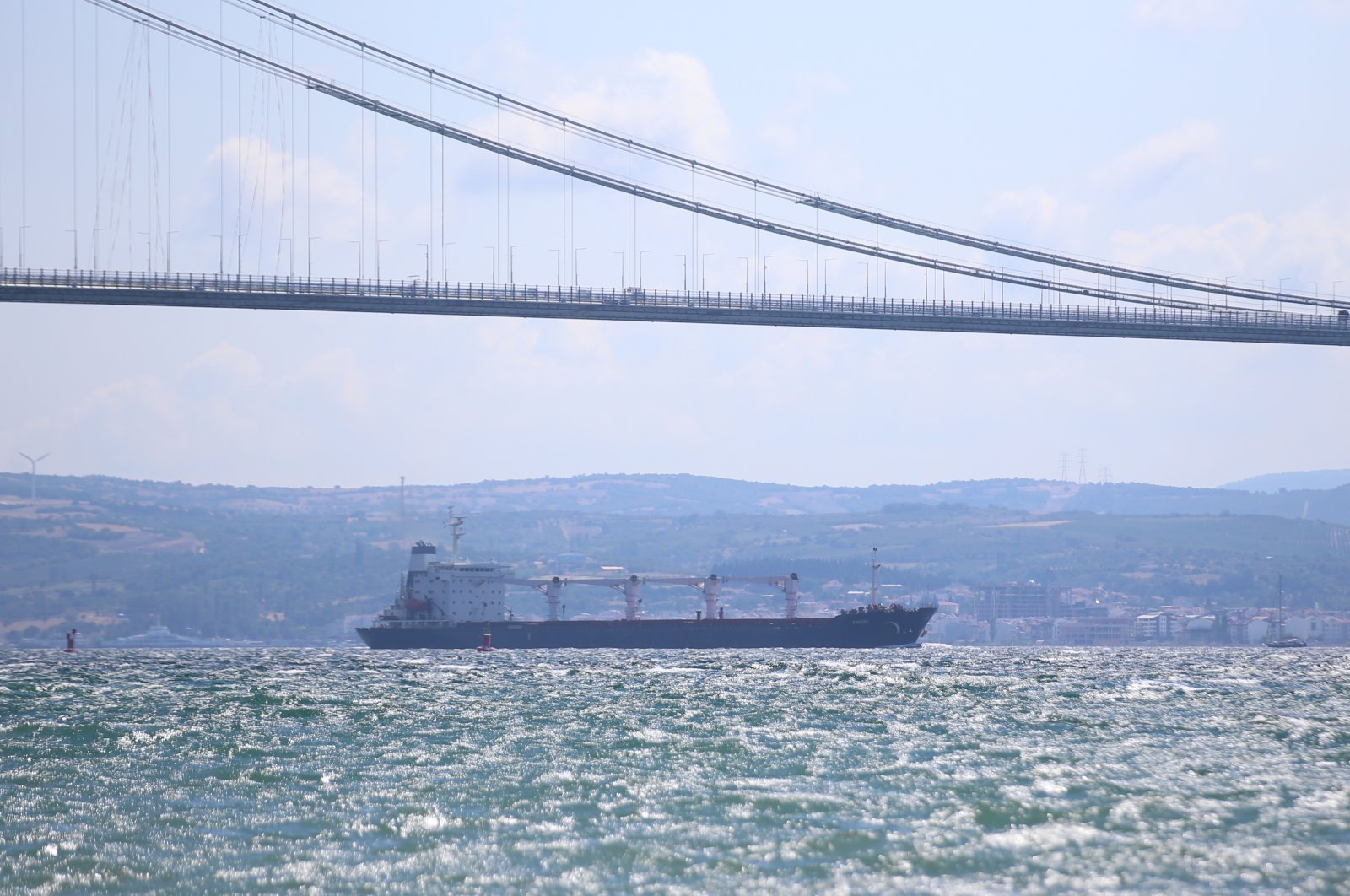 The grain ship "Razoni" sails through the Çanakkale strait in Türkiye, Aug. 4, 2022. (AA Photo)
