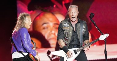 Kirk Hammett (L), and James Hetfield of Metallica perform on day one of the Lollapalooza Music Festival, Grant Park in Chicago, U.S., July 28, 2022. (AP Photo)