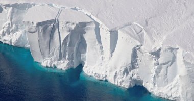 An aerial view shows the 60-meter-tall front of the Getz Ice Shelf with cracks, in Antarctica. (NASA via Reuters)