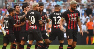 AC Milan players celebrate a goal during a friendly match against Olympique Marseille, Marseille, France, July 31, 2022. (AFP Photo)