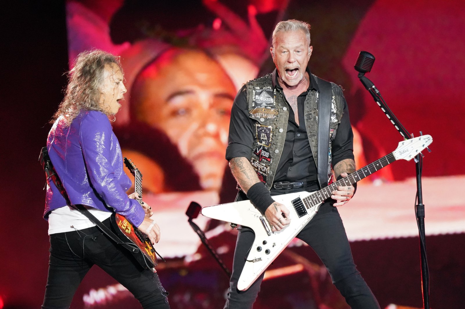 Kirk Hammett (L), and James Hetfield of Metallica perform on day one of the Lollapalooza Music Festival, Grant Park in Chicago, U.S., July 28, 2022. (AP Photo)
